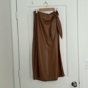Tan leather wrap skirt with bow